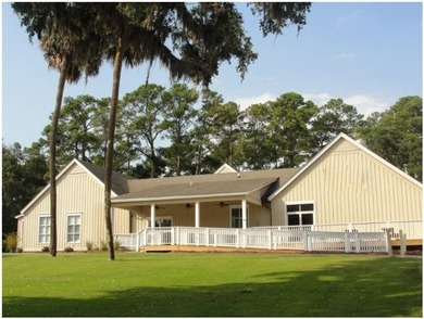 1st Floor exterior villa is privately located on #18th tee box on The Plantation Course At Edisto in South Carolina - for sale on GolfHomes.com, golf home, golf lot