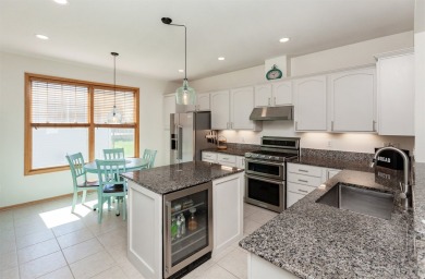 Pride of ownership and attention to detail shine throughout this on Otter Creek Golf Course in Iowa - for sale on GolfHomes.com, golf home, golf lot