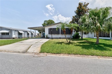 Live the dream in this beautifully updated 2BR/2BA home in on Barefoot Bay Golf Course in Florida - for sale on GolfHomes.com, golf home, golf lot