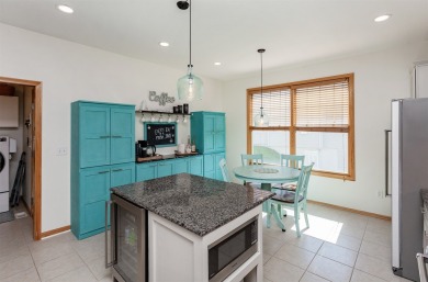 Pride of ownership and attention to detail shine throughout this on Otter Creek Golf Course in Iowa - for sale on GolfHomes.com, golf home, golf lot