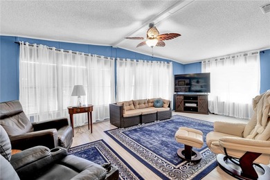 Live the dream in this beautifully updated 2BR/2BA home in on Barefoot Bay Golf Course in Florida - for sale on GolfHomes.com, golf home, golf lot