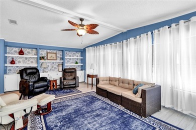 Live the dream in this beautifully updated 2BR/2BA home in on Barefoot Bay Golf Course in Florida - for sale on GolfHomes.com, golf home, golf lot