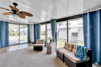 Live the dream in this beautifully updated 2BR/2BA home in on Barefoot Bay Golf Course in Florida - for sale on GolfHomes.com, golf home, golf lot