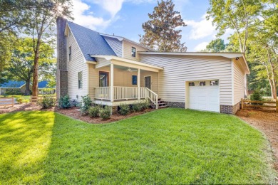 Welcome to 245 Watersedge Drive, a charming traditional home on Caledonia Golf and Fish Club in South Carolina - for sale on GolfHomes.com, golf home, golf lot