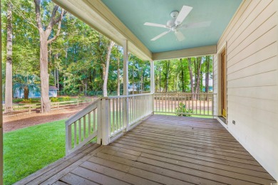 Welcome to 245 Watersedge Drive, a charming traditional home on Caledonia Golf and Fish Club in South Carolina - for sale on GolfHomes.com, golf home, golf lot