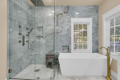 Situated on over an acre along the fourth hole of the Dunes West on Dunes West Golf Club in South Carolina - for sale on GolfHomes.com, golf home, golf lot