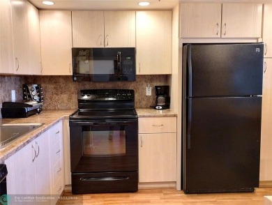 TURN KEY 900 SQ FT 1 BEDROOM IN PRESTIGIOUS ARUBA. EVERYTHING on Wynmoor Golf Course in Florida - for sale on GolfHomes.com, golf home, golf lot