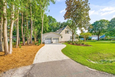 Welcome to 245 Watersedge Drive, a charming traditional home on Caledonia Golf and Fish Club in South Carolina - for sale on GolfHomes.com, golf home, golf lot