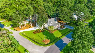 Welcome to 245 Watersedge Drive, a charming traditional home on Caledonia Golf and Fish Club in South Carolina - for sale on GolfHomes.com, golf home, golf lot