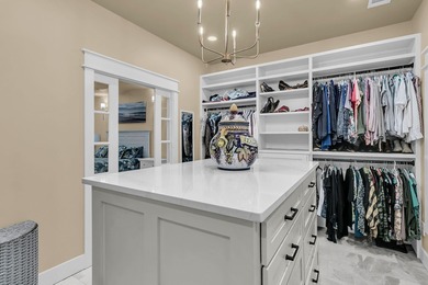 Situated on over an acre along the fourth hole of the Dunes West on Dunes West Golf Club in South Carolina - for sale on GolfHomes.com, golf home, golf lot