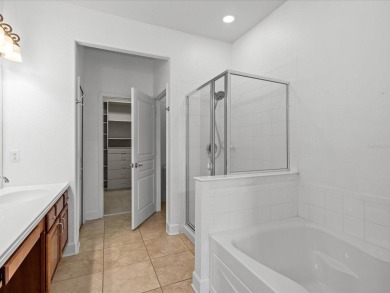 Rare End-Unit Townhome in Gated Bella Trae - Resort-Style Living on ChampionsGate Golf Resort in Florida - for sale on GolfHomes.com, golf home, golf lot