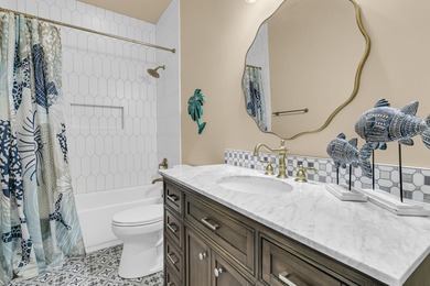 Situated on over an acre along the fourth hole of the Dunes West on Dunes West Golf Club in South Carolina - for sale on GolfHomes.com, golf home, golf lot