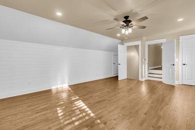 Situated on over an acre along the fourth hole of the Dunes West on Dunes West Golf Club in South Carolina - for sale on GolfHomes.com, golf home, golf lot