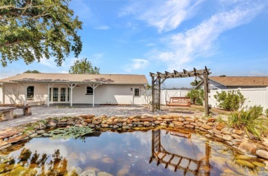 Welcome to your Florida retreat in the desirable Gardens of Gulf on Duffys Golf Center in Florida - for sale on GolfHomes.com, golf home, golf lot