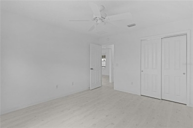 Welcome to this stunning, light-filled home nestled with a on Glenview Championship Golf and Country Club in Florida - for sale on GolfHomes.com, golf home, golf lot