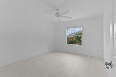 Welcome to this stunning, light-filled home nestled with a on Glenview Championship Golf and Country Club in Florida - for sale on GolfHomes.com, golf home, golf lot