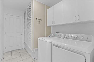 Welcome to this stunning, light-filled home nestled with a on Glenview Championship Golf and Country Club in Florida - for sale on GolfHomes.com, golf home, golf lot