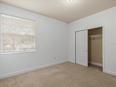 Rare End-Unit Townhome in Gated Bella Trae - Resort-Style Living on ChampionsGate Golf Resort in Florida - for sale on GolfHomes.com, golf home, golf lot
