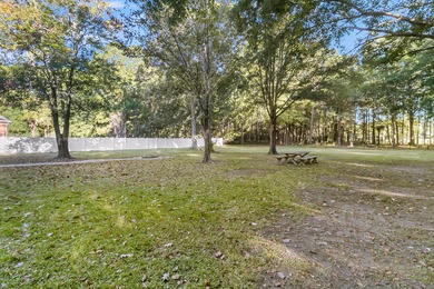 Situated on over an acre along the fourth hole of the Dunes West on Dunes West Golf Club in South Carolina - for sale on GolfHomes.com, golf home, golf lot