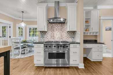 Situated on over an acre along the fourth hole of the Dunes West on Dunes West Golf Club in South Carolina - for sale on GolfHomes.com, golf home, golf lot