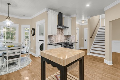 Situated on over an acre along the fourth hole of the Dunes West on Dunes West Golf Club in South Carolina - for sale on GolfHomes.com, golf home, golf lot