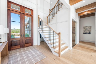 Gracefully situated within the gates of Watersound Camp Creek - on Camp Creek Golf Course in Florida - for sale on GolfHomes.com, golf home, golf lot