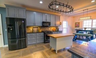 Newly updated family home with great views of the golf course on Nob North Golf Course in Georgia - for sale on GolfHomes.com, golf home, golf lot