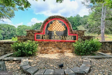 Welcome to your dream retreat! This stunning 1.78-acre lot is on The Orchard Golf and Country Club in Georgia - for sale on GolfHomes.com, golf home, golf lot