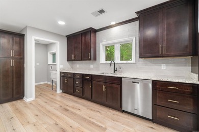 Welcome to this beautifully appointed 4-bdrm, 2.5 bath home on Cortez Golf Course in Arkansas - for sale on GolfHomes.com, golf home, golf lot