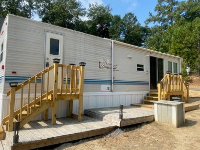 Large Park Trailer with two bedrooms.  One and one half on Captains Cove Golf and Yacht Club in Virginia - for sale on GolfHomes.com, golf home, golf lot