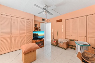 Discover resplendent living at the serene 2802 Victoria Way K4 on Wynmoor Golf Course in Florida - for sale on GolfHomes.com, golf home, golf lot