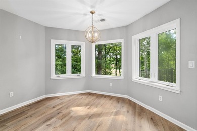 Welcome to this beautifully appointed 4-bdrm, 2.5 bath home on Cortez Golf Course in Arkansas - for sale on GolfHomes.com, golf home, golf lot