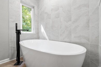 Welcome to this beautifully appointed 4-bdrm, 2.5 bath home on Cortez Golf Course in Arkansas - for sale on GolfHomes.com, golf home, golf lot