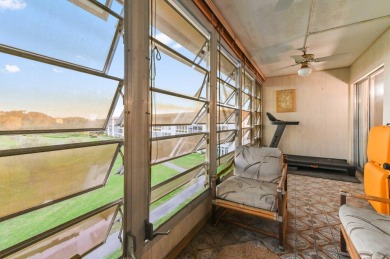 Discover resplendent living at the serene 2802 Victoria Way K4 on Wynmoor Golf Course in Florida - for sale on GolfHomes.com, golf home, golf lot