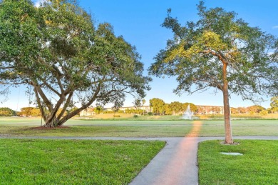 Discover resplendent living at the serene 2802 Victoria Way K4 on Wynmoor Golf Course in Florida - for sale on GolfHomes.com, golf home, golf lot