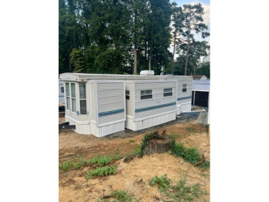 Large Park Trailer with two bedrooms.  One and one half on Captains Cove Golf and Yacht Club in Virginia - for sale on GolfHomes.com, golf home, golf lot