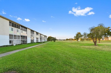 Discover resplendent living at the serene 2802 Victoria Way K4 on Wynmoor Golf Course in Florida - for sale on GolfHomes.com, golf home, golf lot