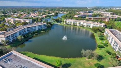 Discover resplendent living at the serene 2802 Victoria Way K4 on Wynmoor Golf Course in Florida - for sale on GolfHomes.com, golf home, golf lot