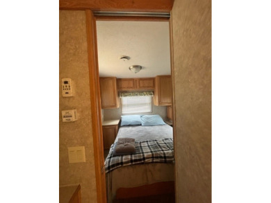 Large Park Trailer with two bedrooms.  One and one half on Captains Cove Golf and Yacht Club in Virginia - for sale on GolfHomes.com, golf home, golf lot