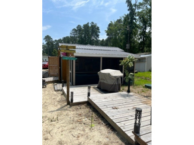 Large Park Trailer with two bedrooms.  One and one half on Captains Cove Golf and Yacht Club in Virginia - for sale on GolfHomes.com, golf home, golf lot