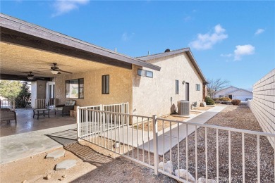 Welcome to this charming 3-bedroom, 2-bathroom corner-lot home on Spring Valley Lake Country Club in California - for sale on GolfHomes.com, golf home, golf lot