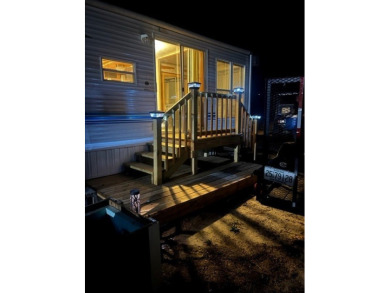 Large Park Trailer with two bedrooms.  One and one half on Captains Cove Golf and Yacht Club in Virginia - for sale on GolfHomes.com, golf home, golf lot