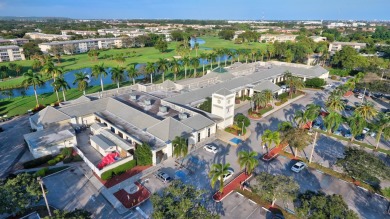 Discover resplendent living at the serene 2802 Victoria Way K4 on Wynmoor Golf Course in Florida - for sale on GolfHomes.com, golf home, golf lot