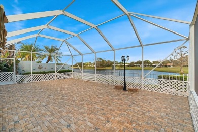 Absolutely Beautiful & stylish LAKEFRONT Divosta built home on Monarch Country Club in Florida - for sale on GolfHomes.com, golf home, golf lot