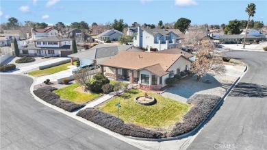 Welcome to this charming 3-bedroom, 2-bathroom corner-lot home on Spring Valley Lake Country Club in California - for sale on GolfHomes.com, golf home, golf lot