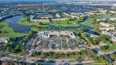 Discover resplendent living at the serene 2802 Victoria Way K4 on Wynmoor Golf Course in Florida - for sale on GolfHomes.com, golf home, golf lot
