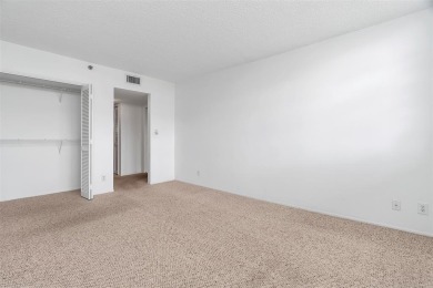 Spacious 3-bed, 2.5-bath condo in sought-after Palm Aire on Oaks on Palm-Aire Country Club and Resort - Palms in Florida - for sale on GolfHomes.com, golf home, golf lot