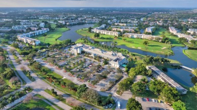 Discover resplendent living at the serene 2802 Victoria Way K4 on Wynmoor Golf Course in Florida - for sale on GolfHomes.com, golf home, golf lot