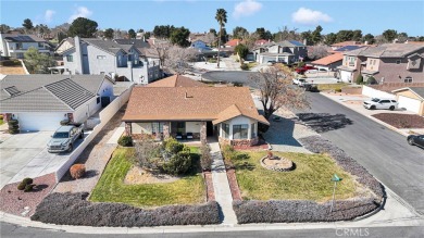 Welcome to this charming 3-bedroom, 2-bathroom corner-lot home on Spring Valley Lake Country Club in California - for sale on GolfHomes.com, golf home, golf lot