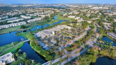 Discover resplendent living at the serene 2802 Victoria Way K4 on Wynmoor Golf Course in Florida - for sale on GolfHomes.com, golf home, golf lot